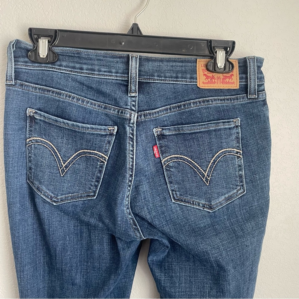 Levi’s Super Skinny Jeans Women’s Size 28 Distressed Raw Hem Medium Wash Denim - Picture 8 of 10